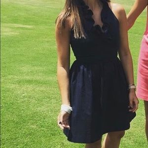 Navy, fitted up top and loose below the waist!